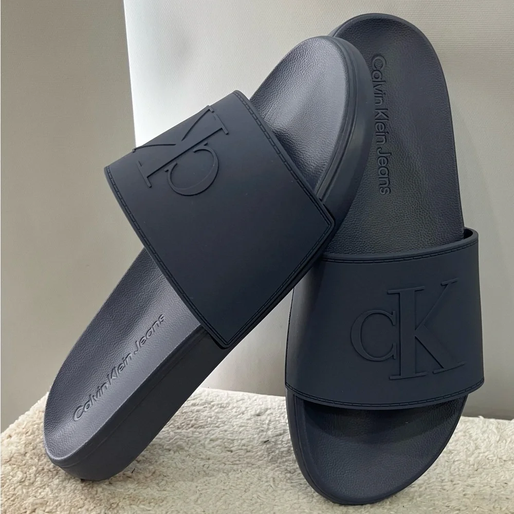 Calvin Klein Medium Gray Embossed CK‎ Slide Sandals